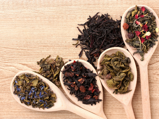 Loose leaf tea on bamboo spoons