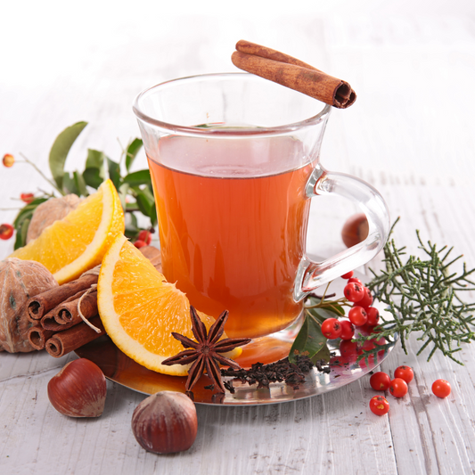 Sunset Spice organic orange spice herbal tea in glass cup