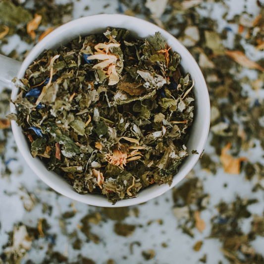 angerine Glow organic tangerine white tea in ceramic cup